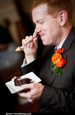 Rob is enjoying the heck out of that cake.