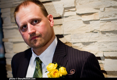 Bill's boutonniere is ranunculus with spiral stem
