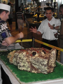 Crown & Anchor logo, or frog cake?