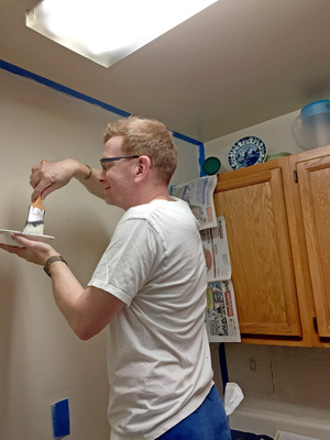 Painting the whole kitchen wall.