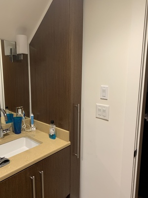 The best part was the narrow wood panels on either side of the sink...