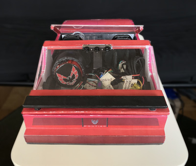 In back is where the batteries and brains live.