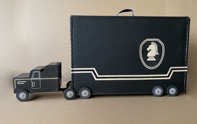 A gift needs a container. I built a replica of the FLAG Mobile Command Center fron Knight Rider using a cardboard box.