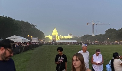 Capital in the haze. A section of new grass was blocked off for regrowth.