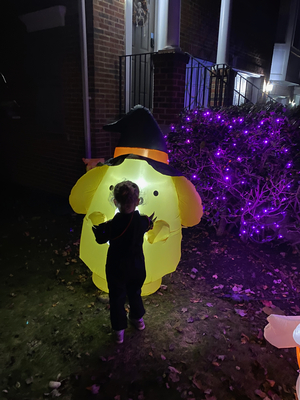 Everly's favorite task was to straighten the inflatable decorations.