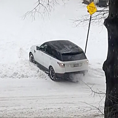Car Stuck Trying to Enter the Alley