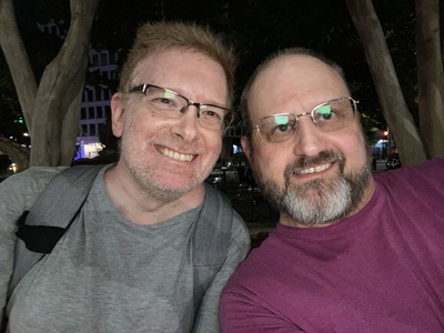 Rob and Bill watch the fireworks from Henry Wadsworth Longfellow Statue at the corner of 18th and M Streets NW.